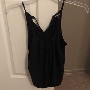 Black tank. Ties in back.